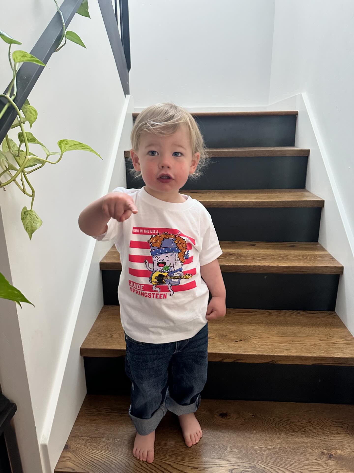 toddler wearing juice springsteen t-shirt