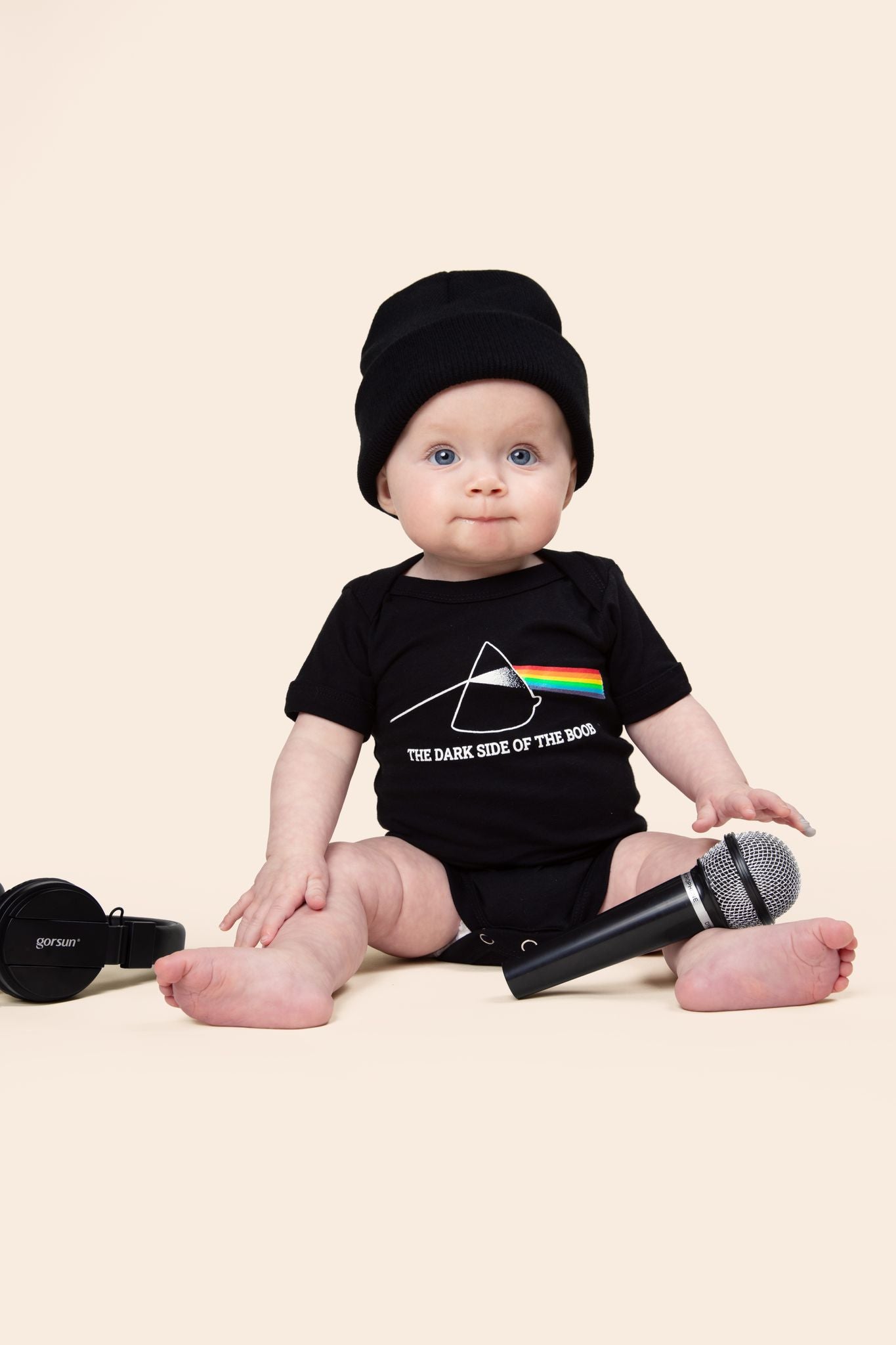 baby wearing a dark side of the boob baby onesie
