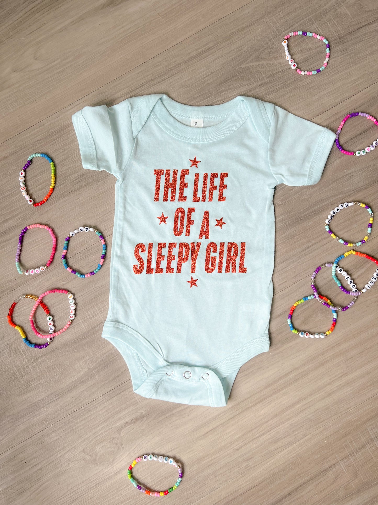 LIFE OF A SLEEPYGIRL Baby Bodysuit