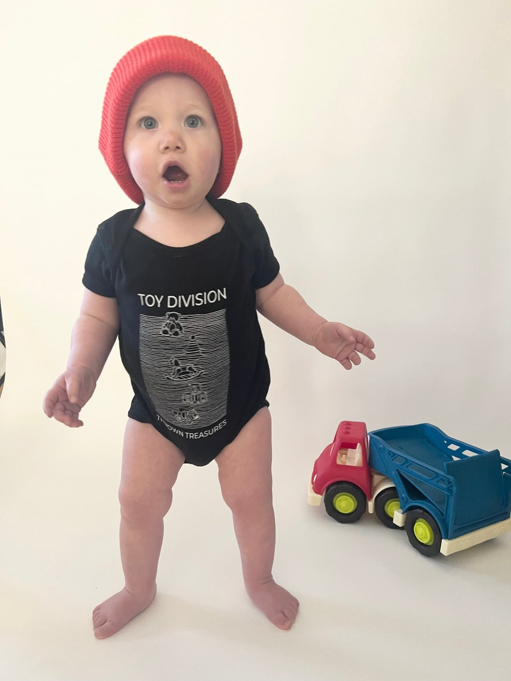 toy division baby bodysuit modeled by baby